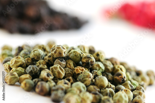 Heaps Of Green Black And Red Peppercorns On White Background Poster Id F