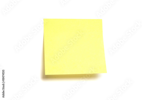Yellow post-it isolated on white