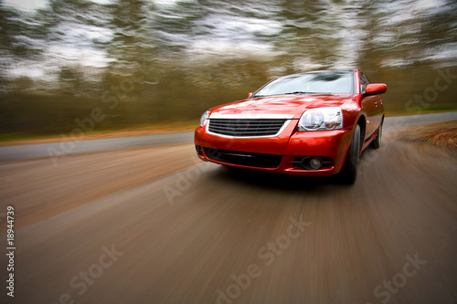 Fototapeta luxury car driving fast
