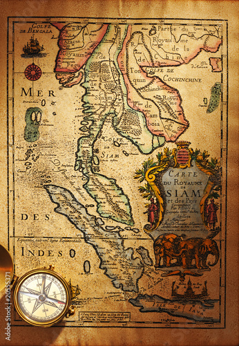 Fototapeta Old brass compass over antique Thailand map