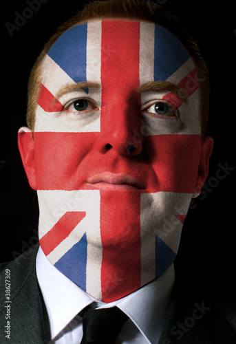 Poster Face of serious businessman or politician painted in colors of u