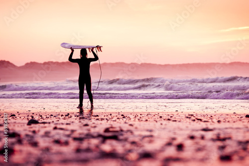 Fototapeta Female surfer