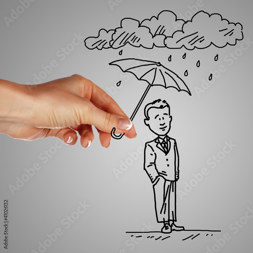  Man under rain holding umbrella