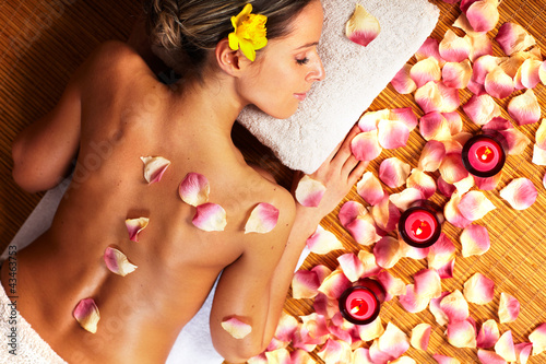 Fototapeta Young woman in Spa massage salon.