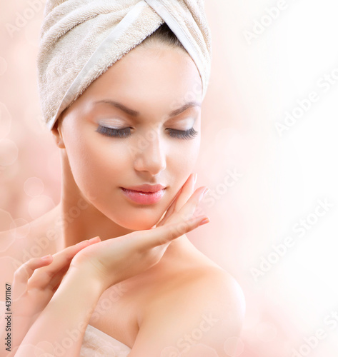Fototapeta Spa Girl. Beautiful Young Woman After Bath Touching Her Face