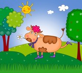happy cow walking on the meadow