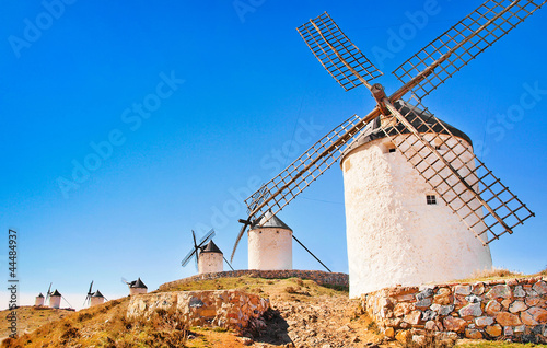 Fototapeta Famous windmills in Consuegra at sunset, Andalusia, Spain