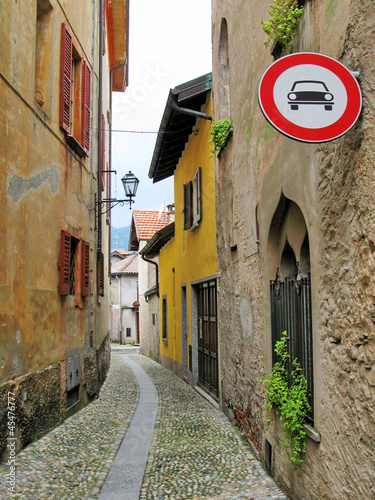 Lacobel No motor vehicles sign on the narrow street of Cannobio, Italy
