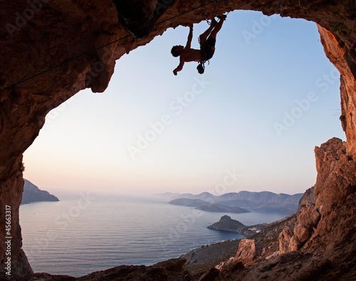 Fototapeta Silhouette of a rock climber at sunset, Kalymnos Island, Greece
