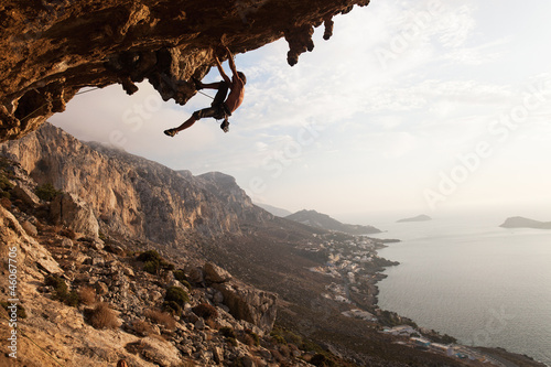  Rock climber at sunset, Kalymnos Island, Greece