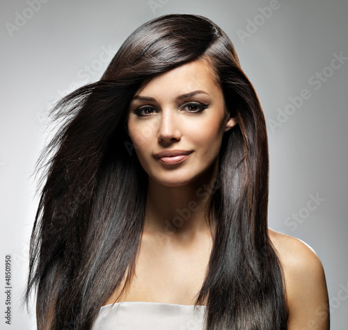 Fototapeta Beautiful woman with long straight hair