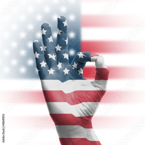 Fototapeta hand OK sign with USA flag