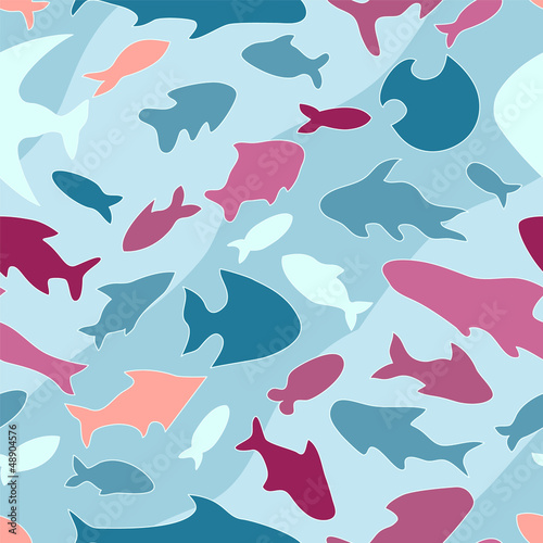 Fototapeta Colorful ocean fish on blue seamless pattern, vector