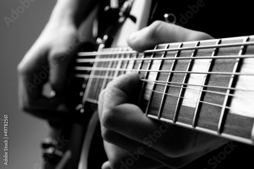Lacobel play the guitar