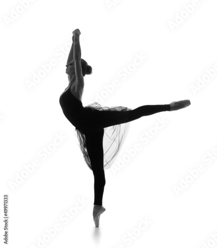 Fototapeta Black and white trace of a young and beautiful ballet dancer
