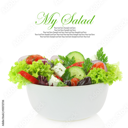 Fototapeta Fresh mixed vegetables salad in a bowl