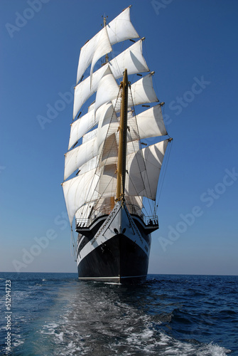  Sailing frigate under full sail in the ocean