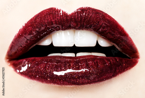  Beautiful red glossy lips close up