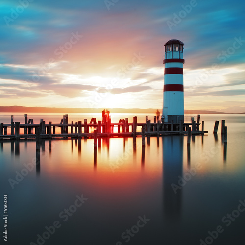 Fototapeta Ocean lighthouse sunset