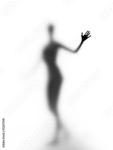 Fototapeta A silhouette of a young woman
