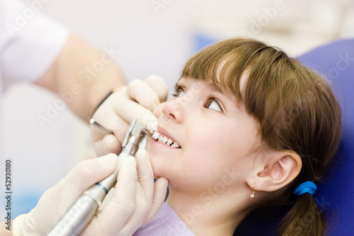  close-up medical dentist procedure of teeth polishing with clean