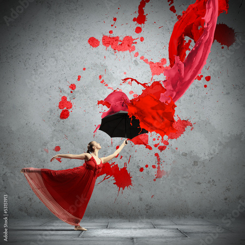 Fototapeta Ballet dancer in flying satin dress with umbrella