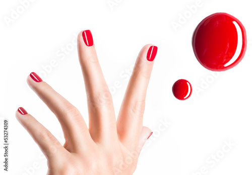 Fototapeta Beautiful female hands with red manicure