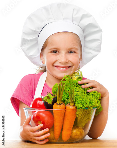 Fototapeta beautiful little girl with vegetables
