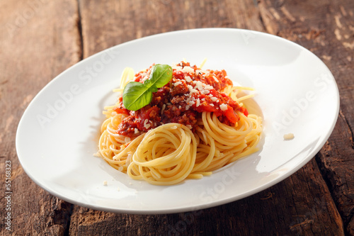 Fototapeta Spaghetti topped with bolognaise sauce
