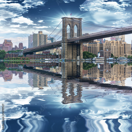 Fototapeta Brooklyn Bridge with beautiful sky reflex on East River