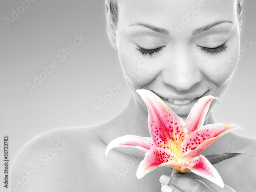  Beauty woman with a lily flower