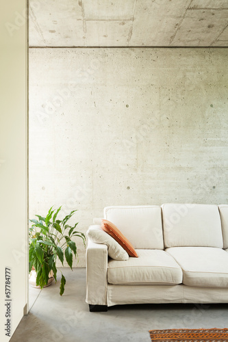 Fototapeta beautiful modern house in cement, interiors, detail divan