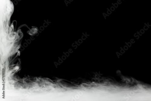 Fototapeta dense smoke frame isolated on black