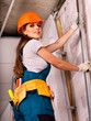 Woman in builder uniform.
