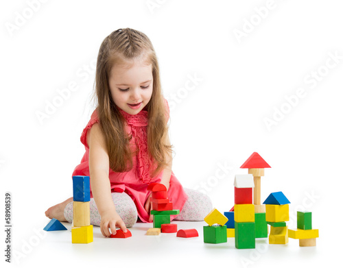 Fototapeta kid girl playing with block toys