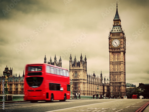 Lacobel London, the UK. Red bus in motion and Big Ben