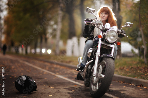 Fototapeta girl on a motorcycle