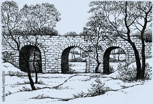  Vector landscape. Old dilapidated stone bridge in the park
