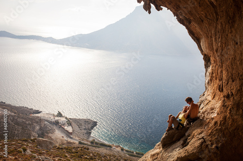 Fototapeta Young couple of rock climbers having a rest, Kalymnos, Greece