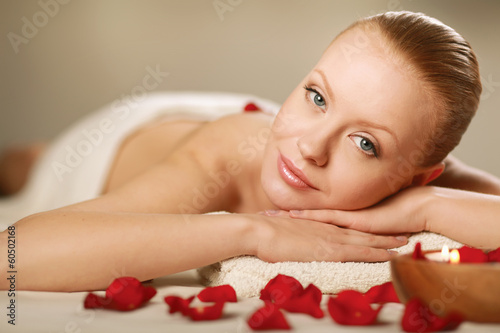 Fototapeta Beautiful young woman getting spa massage