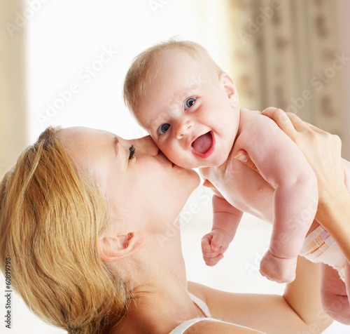  Mother with baby at home