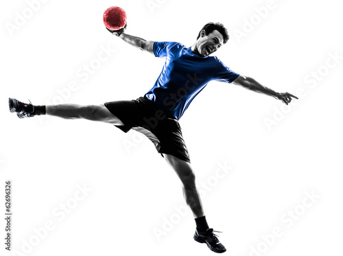 Fototapeta young man exercising handball player silhouette