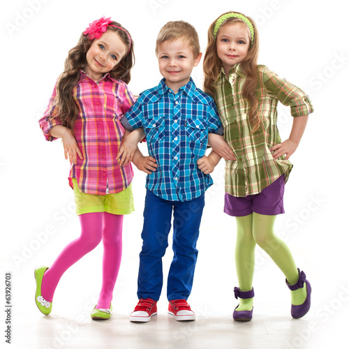 Fototapeta Cute fashion kids are standing together