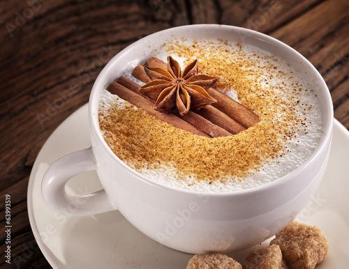  Cup of cappuccino decorated with spices.
