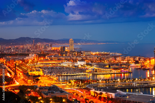  Port Vell and cityspace in Barcelona during evening