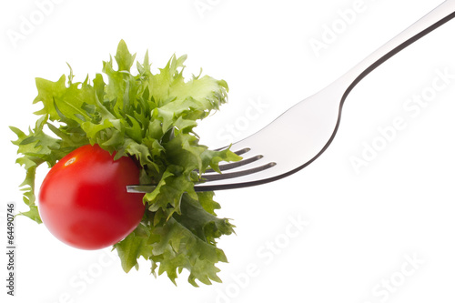  Fresh salad and cherry tomato on fork isolated on white backgrou