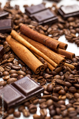 Fototapeta Coffee beans, cinnamon stick and chocolate