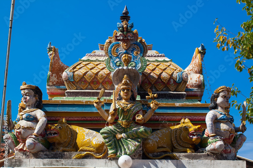 Fototapeta Hindu deities on the facade of temple and cultural monuments
