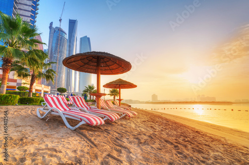 Fototapeta Sunrise on the beach at Perian Gulf in Abu Dhabi