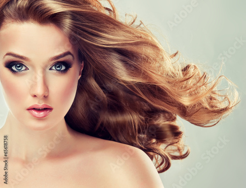Fototapeta Beautiful model blond with curly hair
